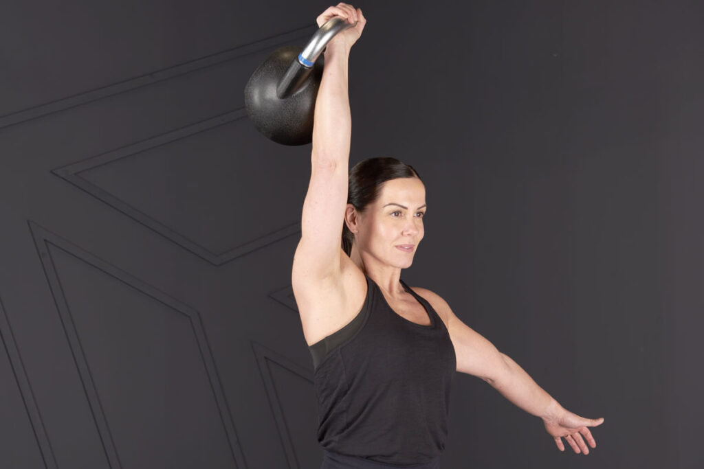 Kettlebell shoulder press with a Mirafit Urethane Competition Kettlebell
