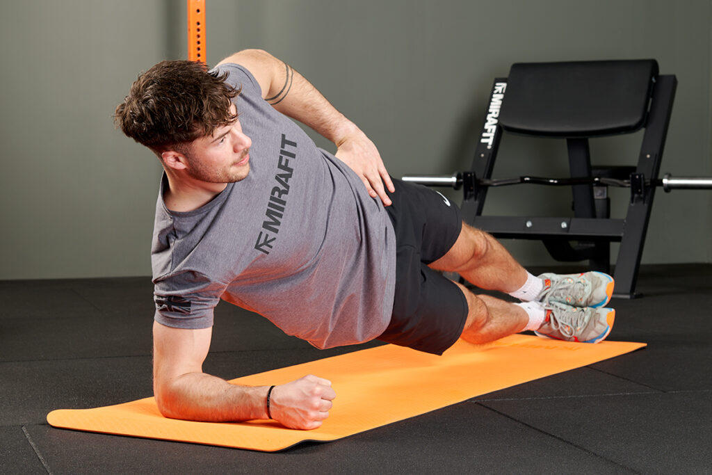Mirafit 2 Tone TPE Exercise Mat Plank hip dip on Mirafit Exercise Mat