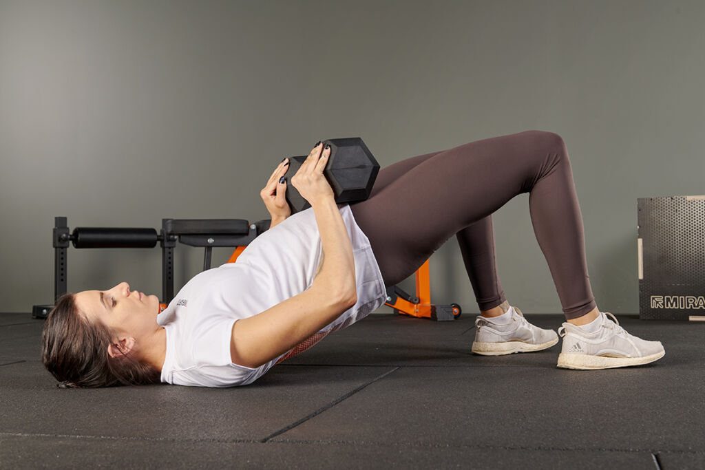 Glute bridges with Mirafit Hex Dumbbells