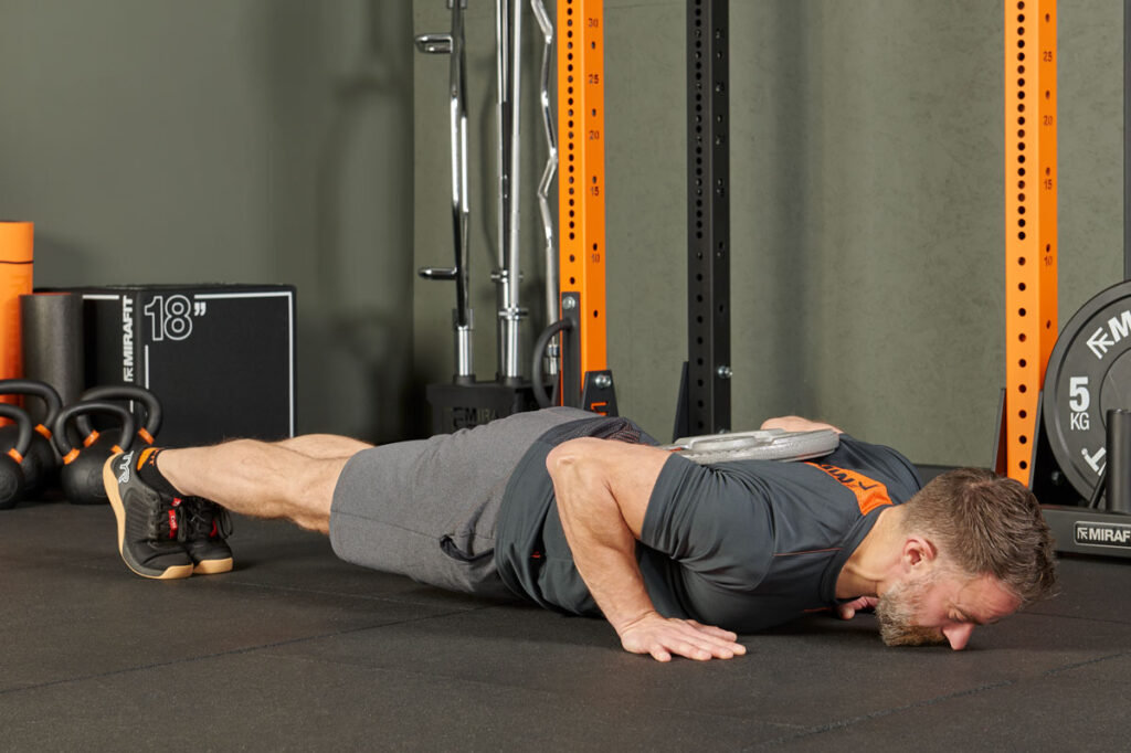 Push Up with Mirafit Cast Iron Tri Grip Weight Plate