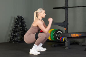 Squat using a Mirafit Resistance Band