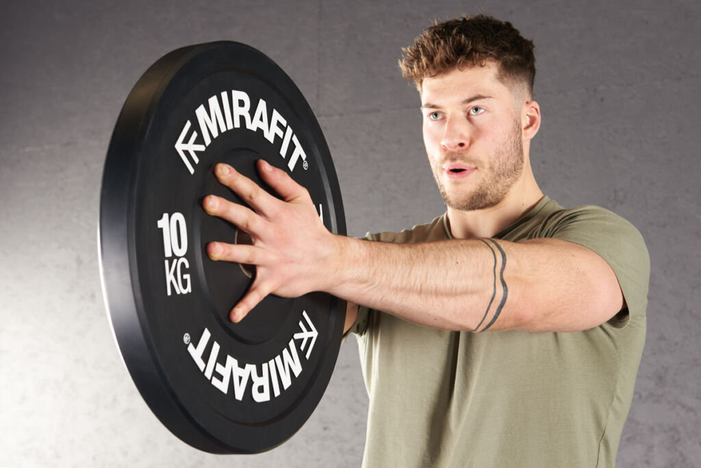Mirafit Black Olympic Rubber Bumper Plates Svend press using a Mirafit Bumper Plate