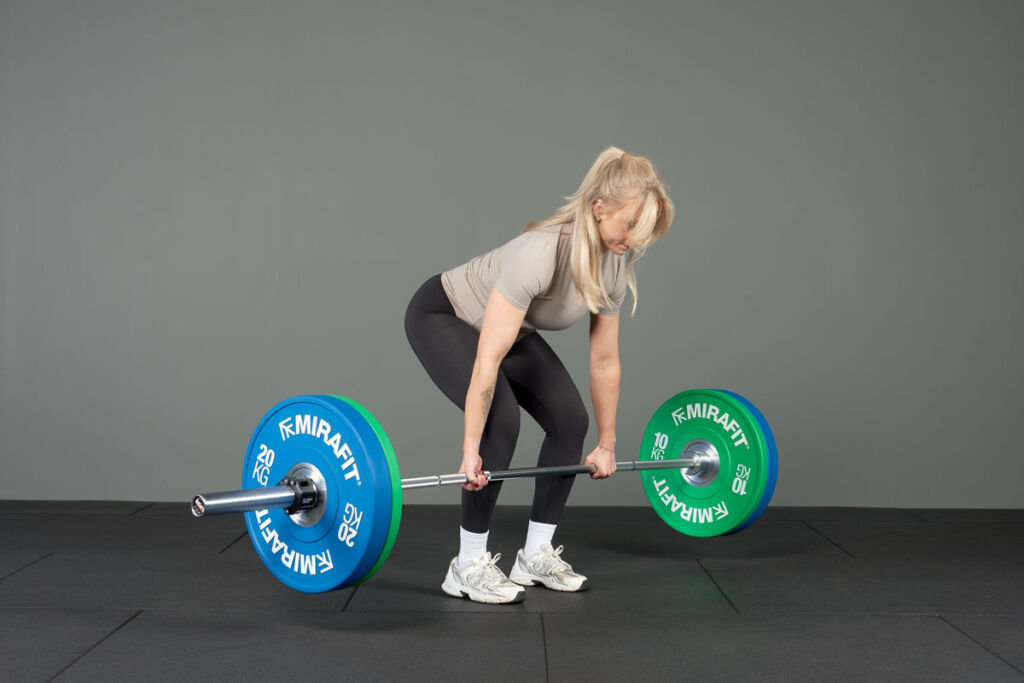 Deadlift using Mirafit Narrow Coloured Olympic Bumper Plates