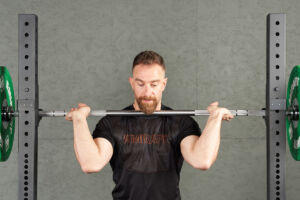 Overhead press with Mirafit Urethane Bumper Plates