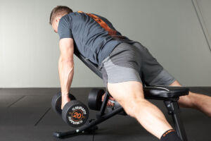 Kelso shrugs using Mirafit 20kg Dumbbells