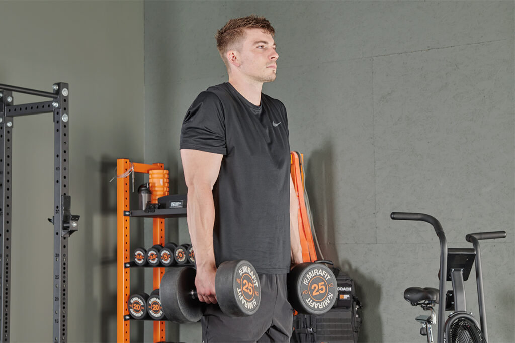 Dumbbell shrugs with Mirafit 25kg Dumbbells