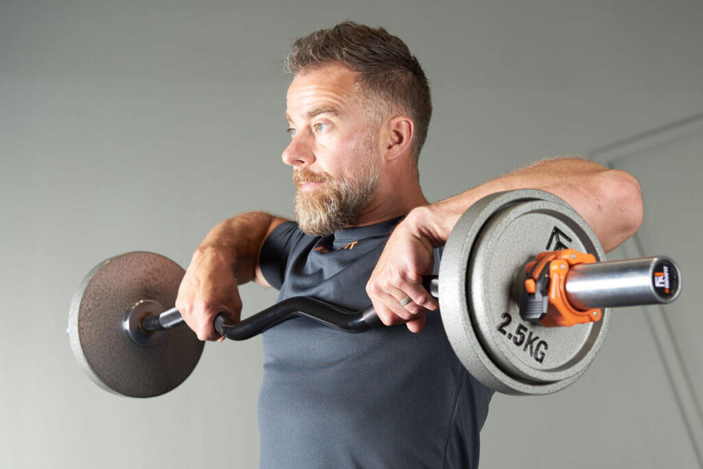 Upright row using a Mirafit EZ Curl Bar