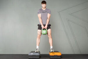 Kettlebell Deficit Deadlift on Exercise Steps