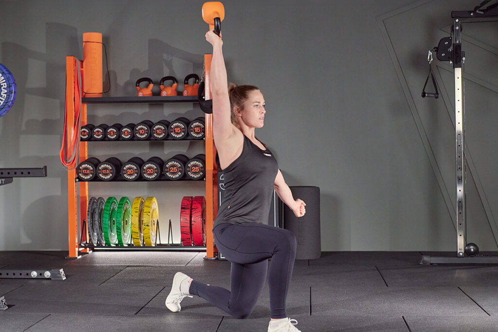 Half kneeling overhead press with Mirafit Kettlebell