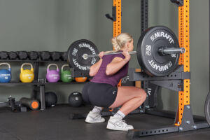 Back squat with Mirafit barbell in home gym