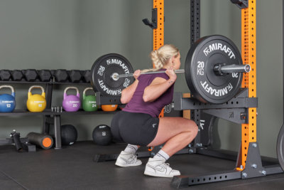 Back squat with Mirafit barbell in home gym