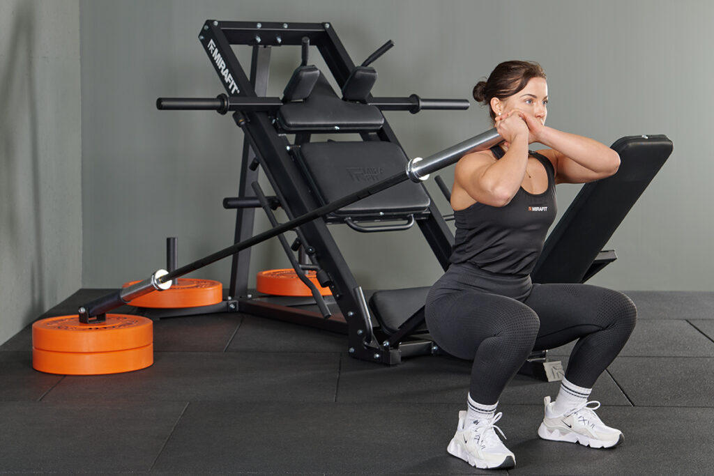 Mirafit Post Landmine Hack squat using a Mirafit Post Landmine and barbell