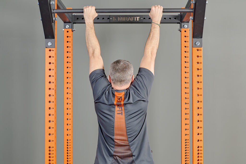Passive hang on a Mirafit Power Rack