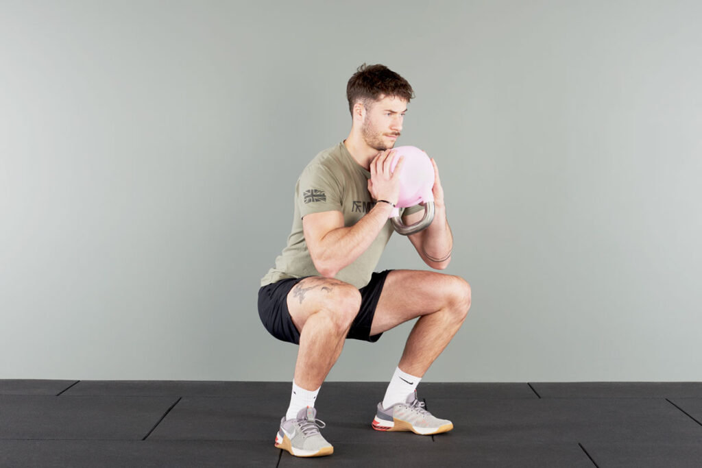 goblet squat with Mirafit Colour Competition Kettlebell
