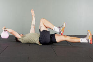 Weighted offset dead bug with Mirafit Kettlebell