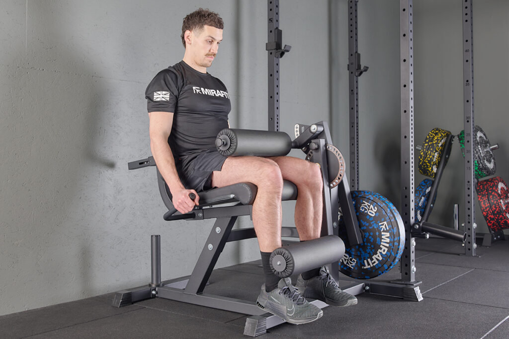 Mirafit Leg Curl and Extension Machine Leg extensions on a Mirafit Leg Extension Machine