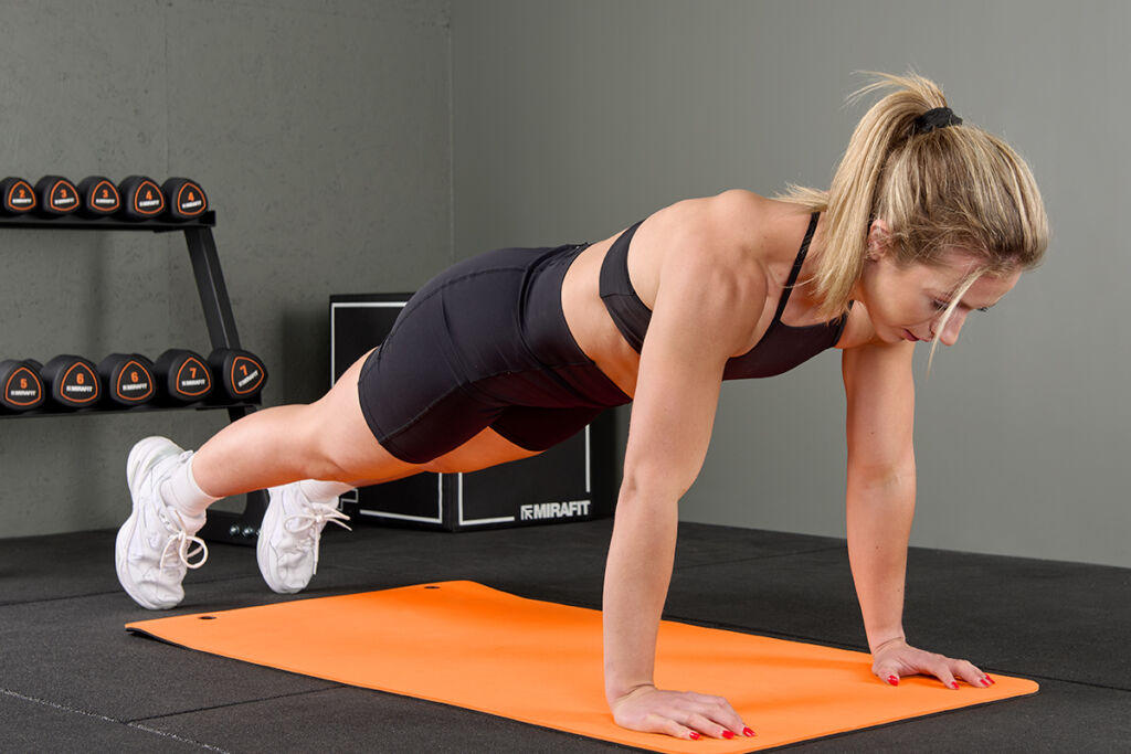 Mirafit Hybrid Plyo Jump Box Mirafit push up in a small home gym