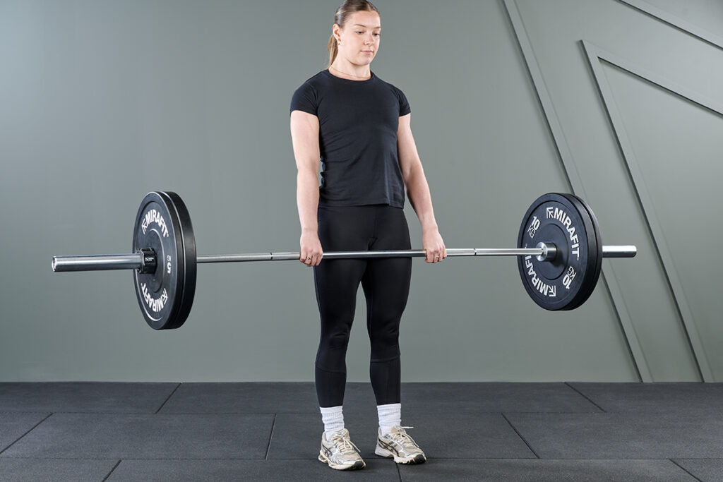 deadlift using Mirafit Black Olympic Rubber Bumper Plates