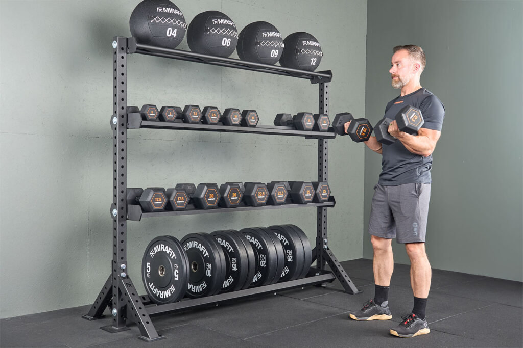 Bicep curl next to a Mirafit M3 Modular Storage System