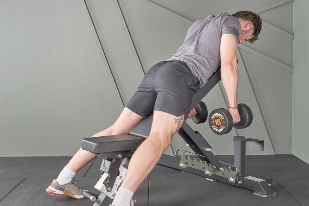 Incline dumbbell shrug with Mirafit 15kg dumbbells