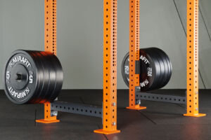 Weight plates loaded onto Mirafit M4 Quick Release Weight Poles