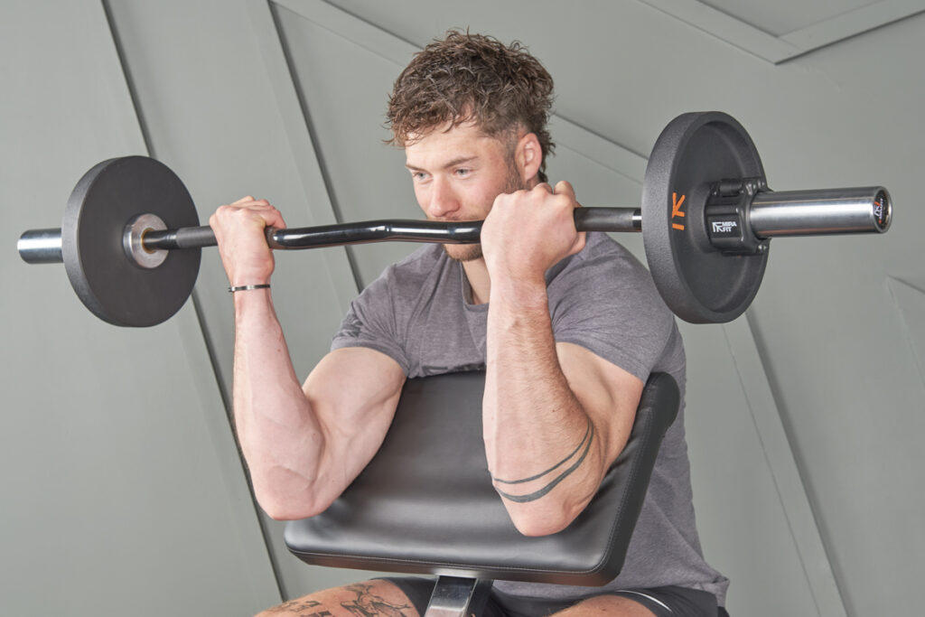 Preacher Curl Preacher curl on a Mirafit M1 Preacher Curl Bench