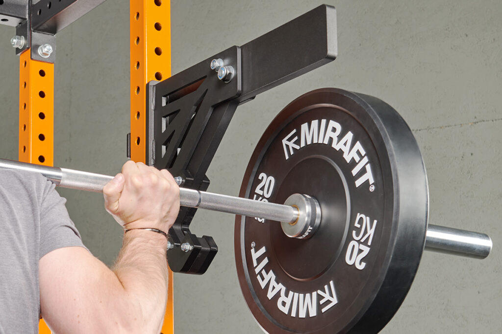 Mirafit M3 Monolift Attachment Unracking a barbell from the Mirafit M3 Monolift Attachment