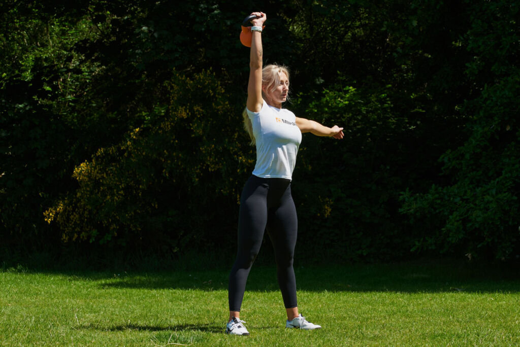 Single Arm Clean and Press Single arm clean and press with a Mirafit Kettlebell
