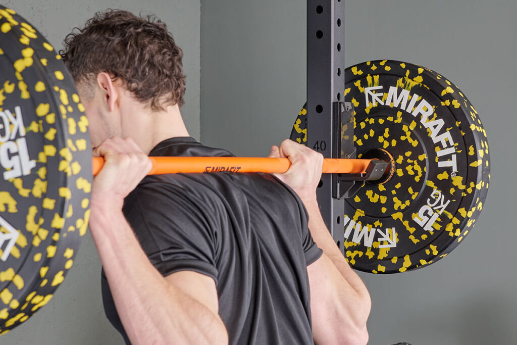 Mirafit Colour Splash Bumper Plates back squat with Mirafit Colour Splash Bumper Plates