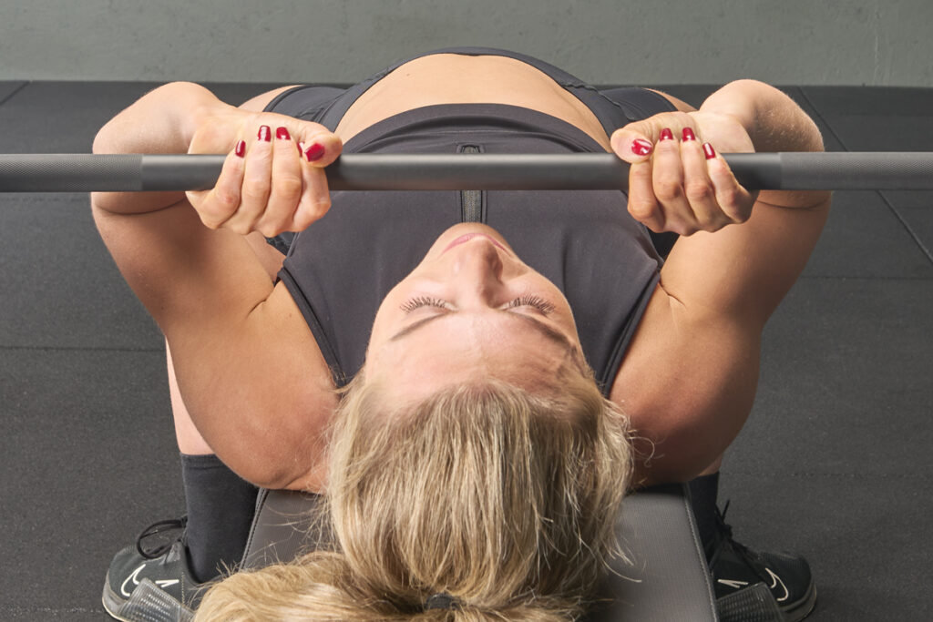 JM Press on a Mirafit M3 Flat Weight Bench