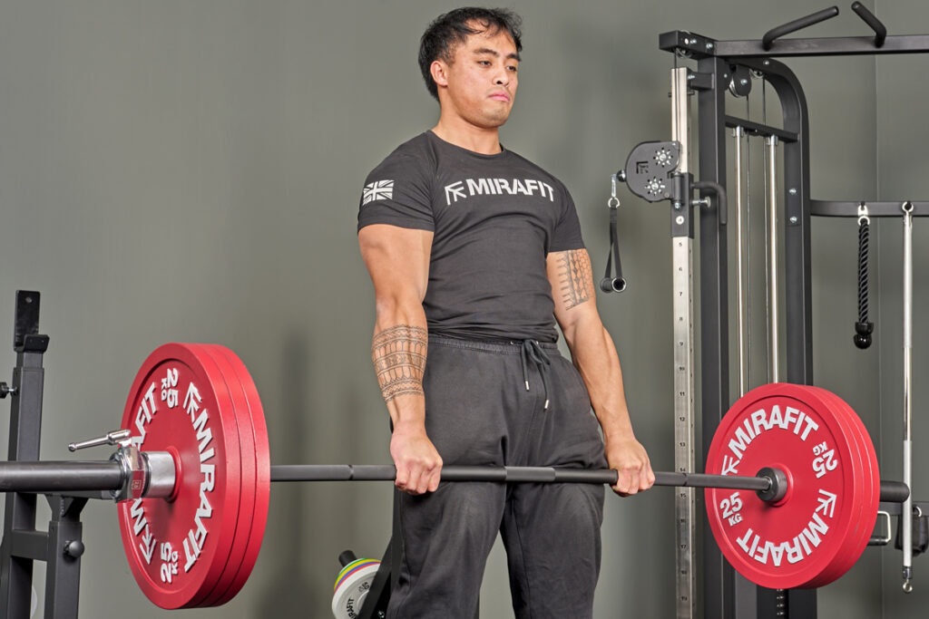 deadlift using Mirafit Calibrated Cast Iron Weight Plates