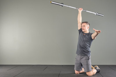 tall kneeling javelin press with a Mirafit 15kg Barbell