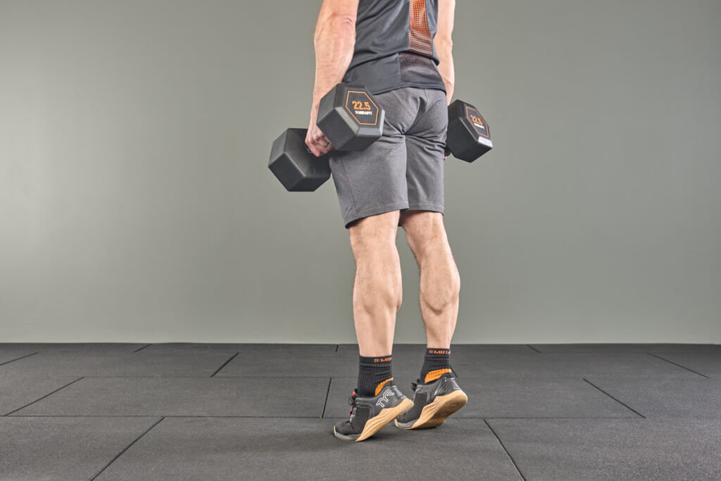 calf raise using Mirafit Rubber Grip Hex Dumbbell
