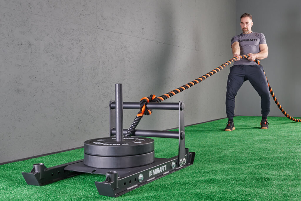 Mirafit M3 Weight Sled standing battle rope sled pull with Mirafit M3 Weight Sled