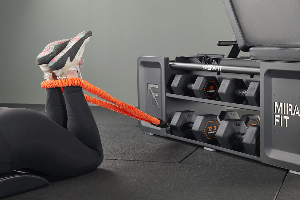 hamstring curl using Mirafit Studio HIIT Bench