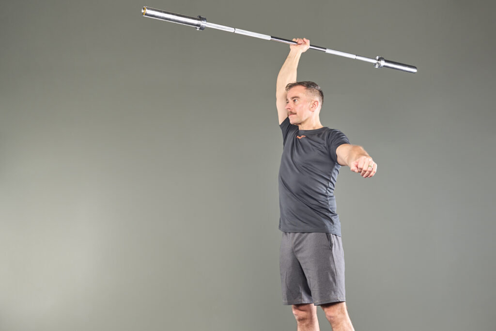 standing javelin press with a Mirafit 15kg Barbell