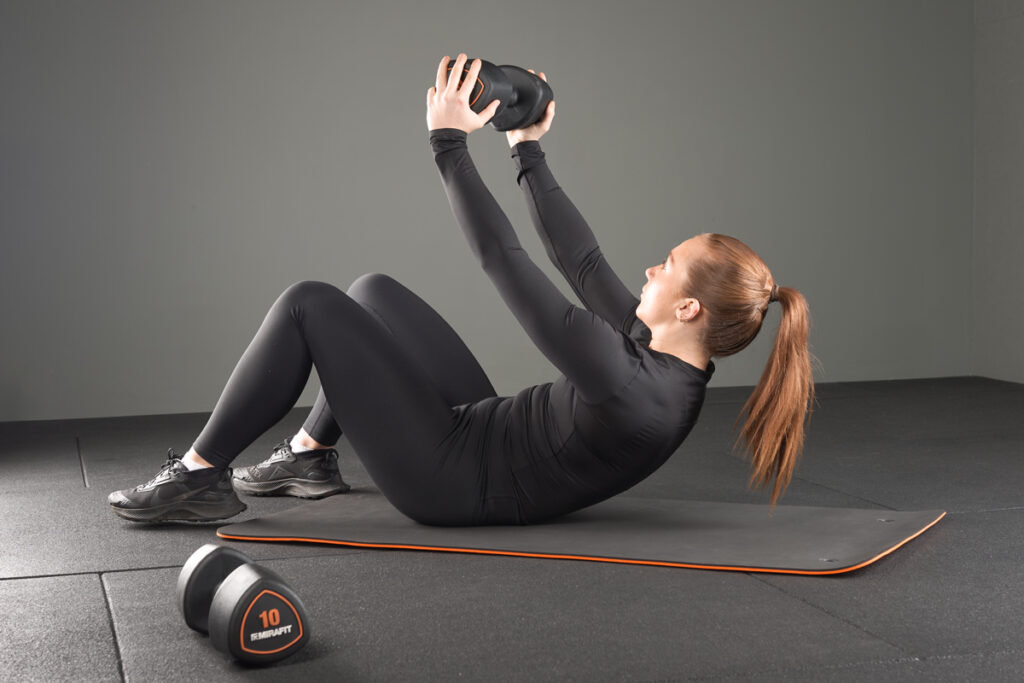 Mirafit Studio Dumbbell Hand Weights Dumbbell Crunch with a Mirafit Studio Dumbbell Hand Weight