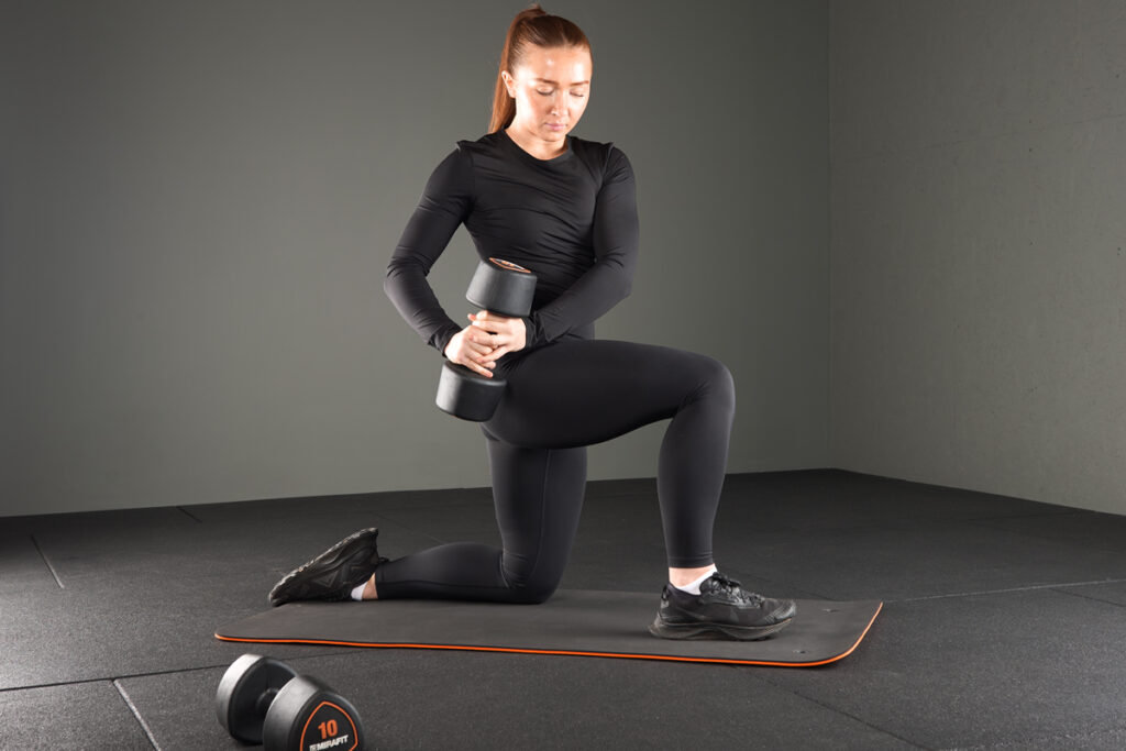 Mirafit 2 Tone TPE Exercise Mat with Eyelets Kneeling woodchopper using Mirafit Studio Dumbbell Hand Weights