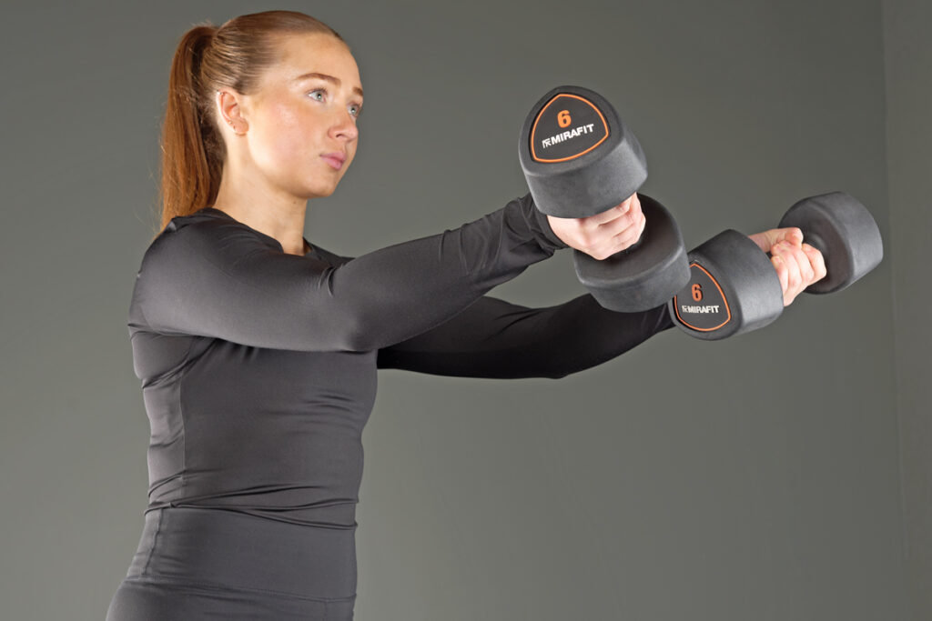 Standing underhand dumbbell flyes with Mirafit dumbbells