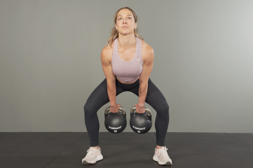 Mirafit Black Competition Kettlebells double kettlebell swings using Mirafit Black Competition Kettlebells