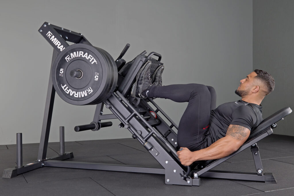 Man using Mirafit Leg Press and Hack Squat Machine