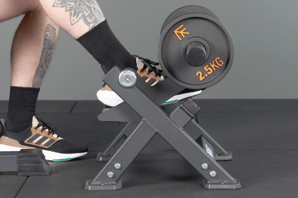 man using Mirafit Tibia Dorsi machine