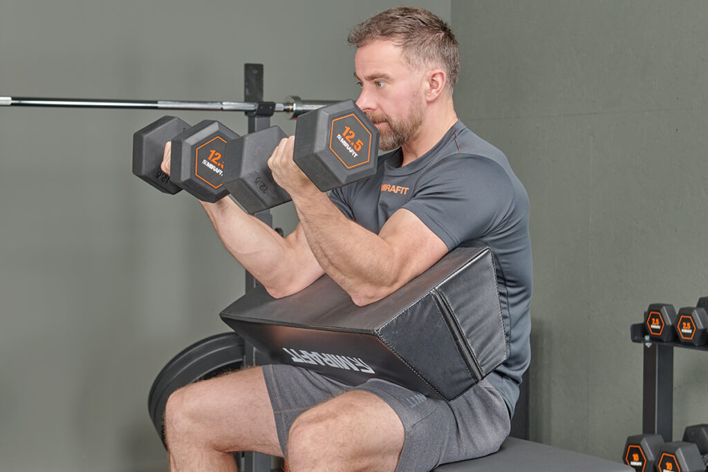Preacher curl on a Mirafit Bicep Isolator