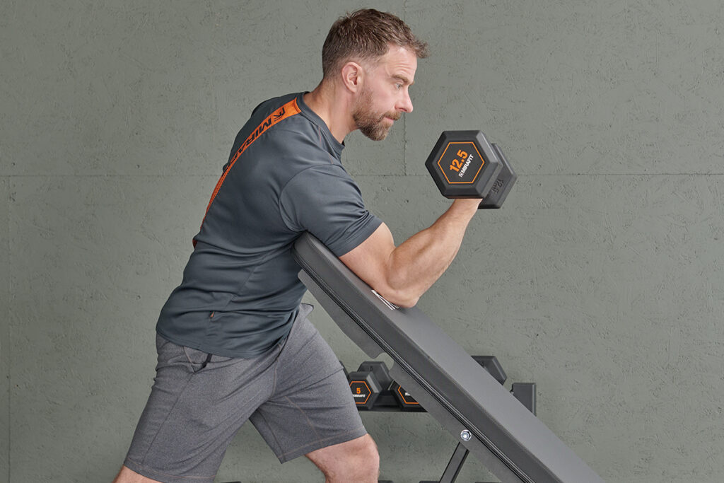 Preacher curl on a Mirafit incline weight bench