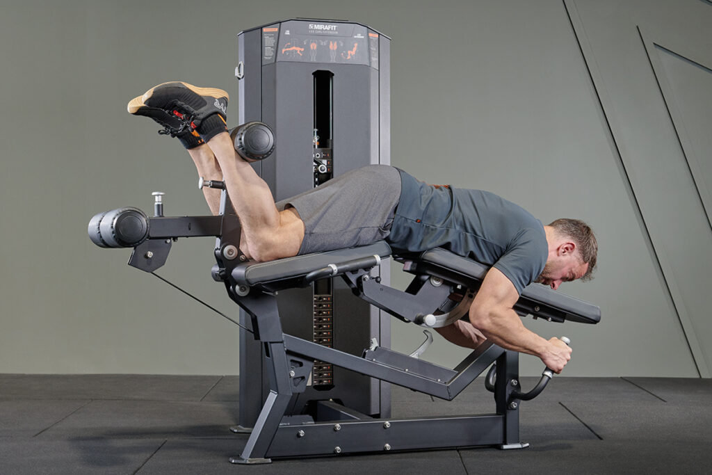 prone leg curl on a Mirafit Leg Curl and Extension Machine with Weight Stack
