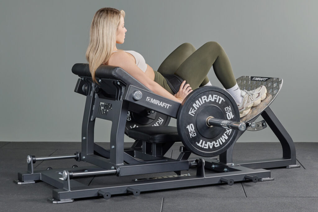 woman using Mirafit Hip Thruster Machine