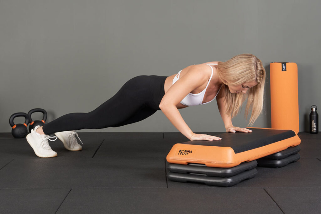 Incline press up on a Mirafit Premium Exercise Step