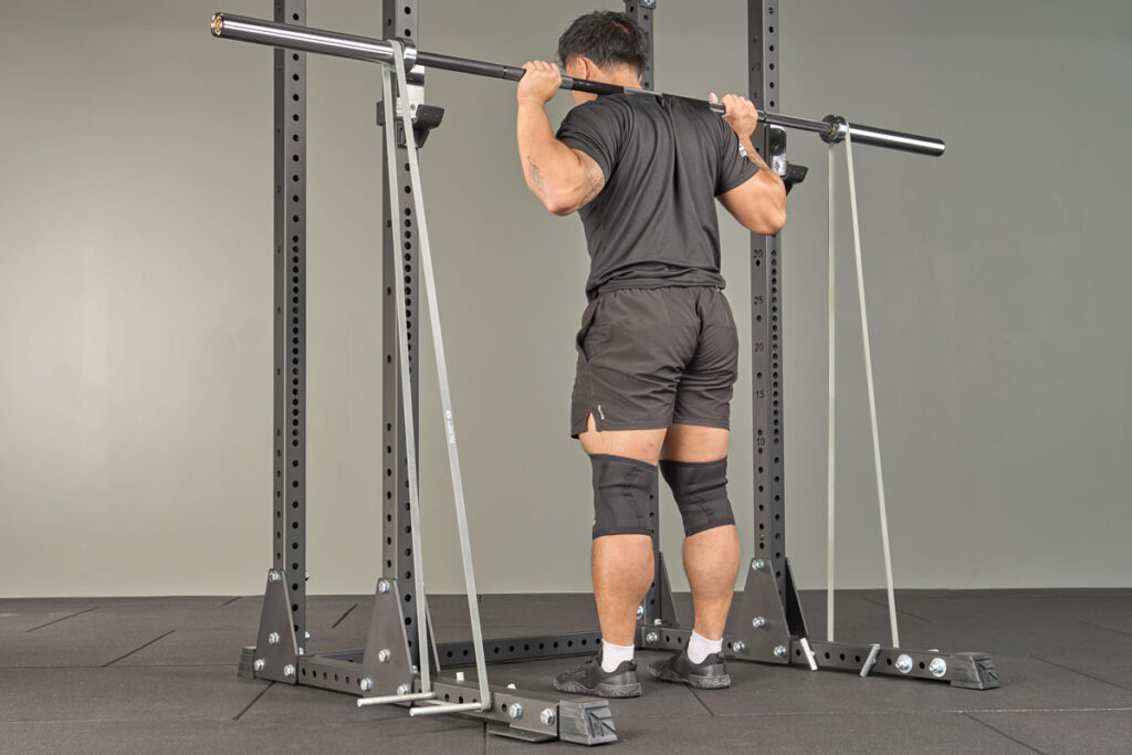 Barbell back squat using Mirafit Resistance Bands