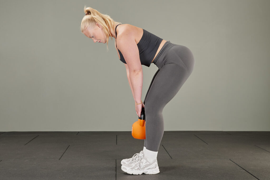 Mirafit Soft Touch Cast Iron Kettlebell Romanian deadlift with Mirafit Soft Touch Cast Iron Kettlebell