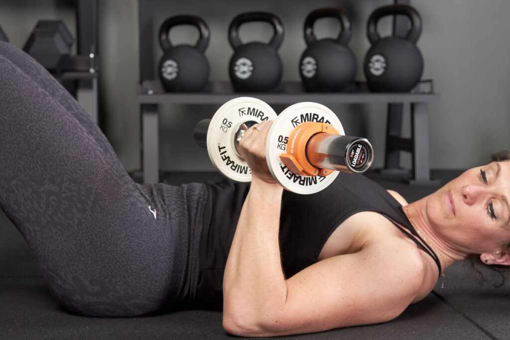 floor bicep curl using Mirafit Loadable Dumbbell Bars
